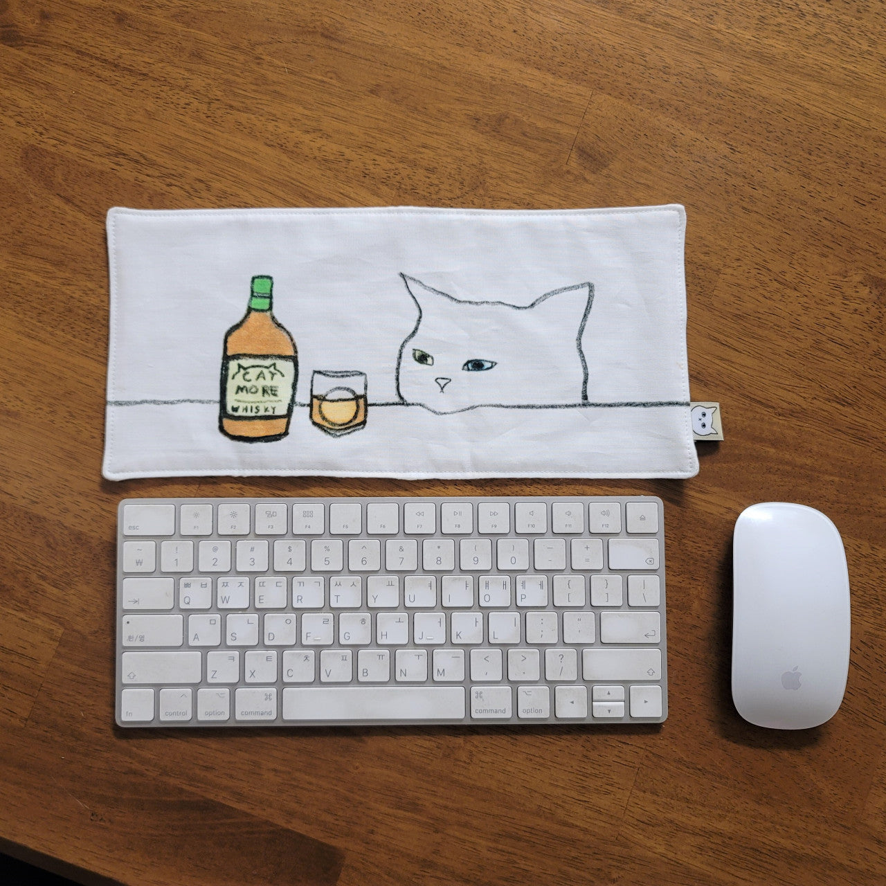 whisky cat, kitchen cross