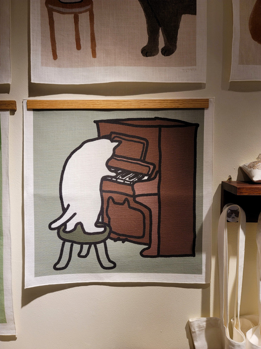 a cat playing the piano, fabric poster