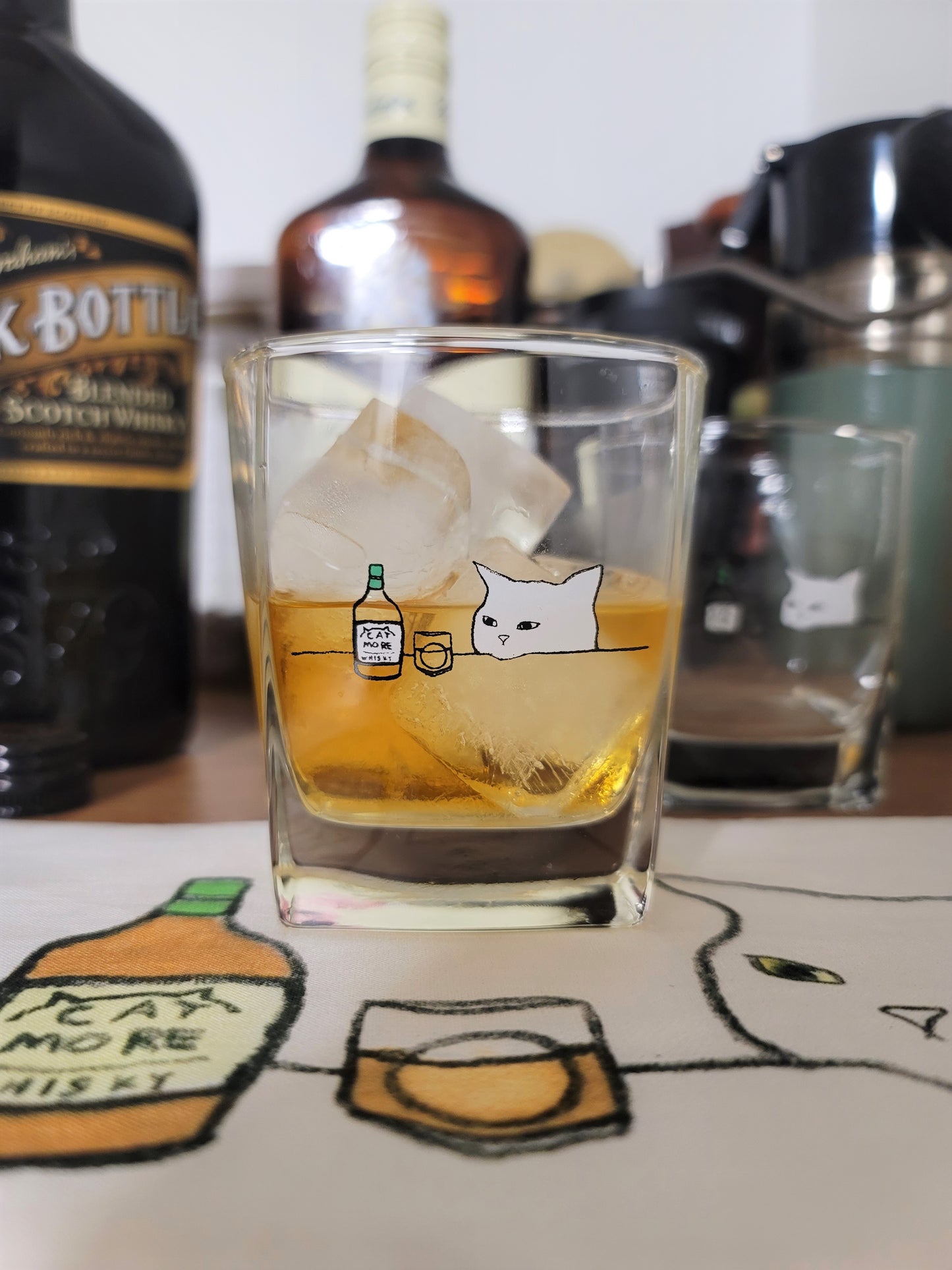 whisky cat, kitchen cross