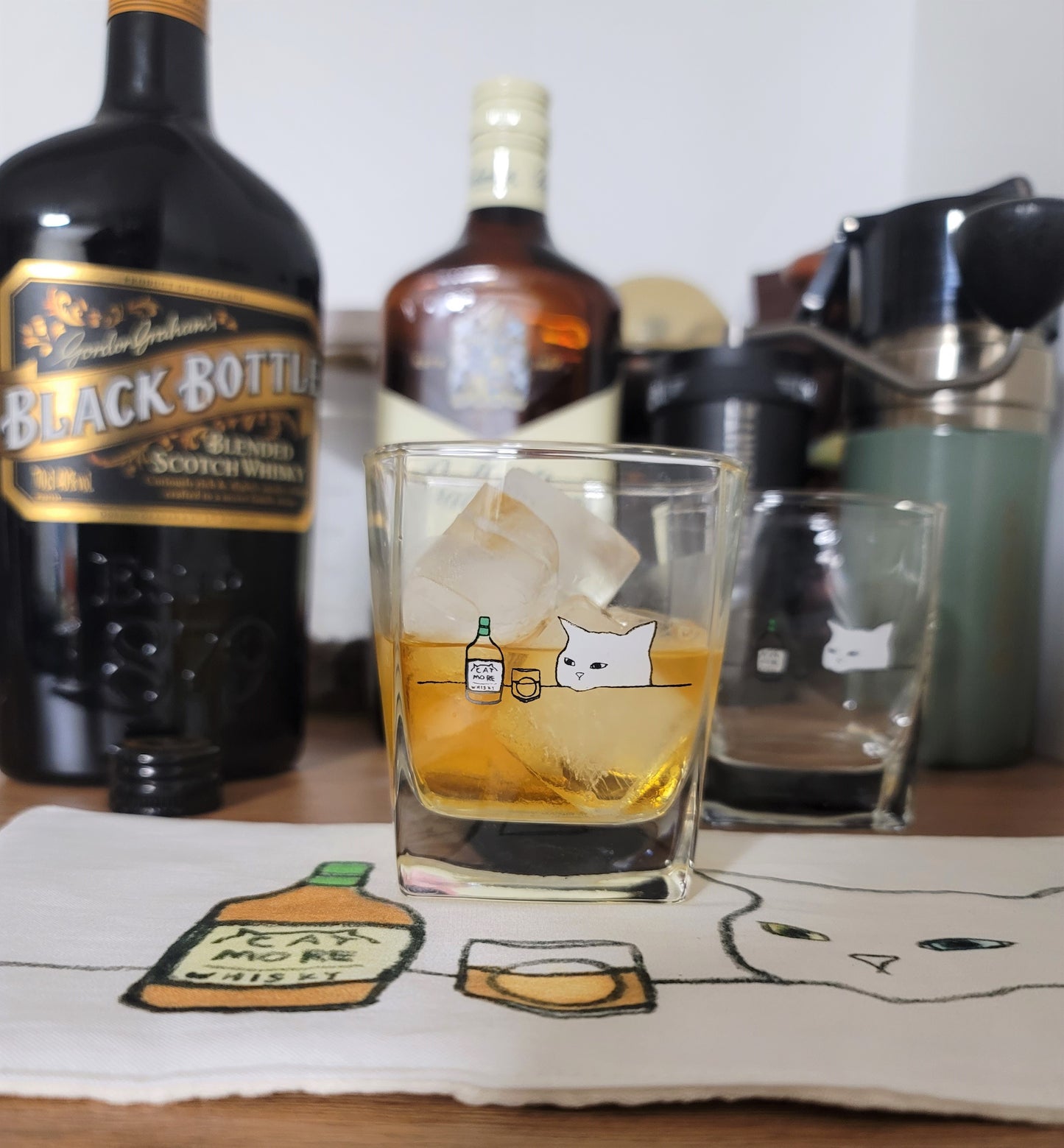 whisky cat, kitchen cross
