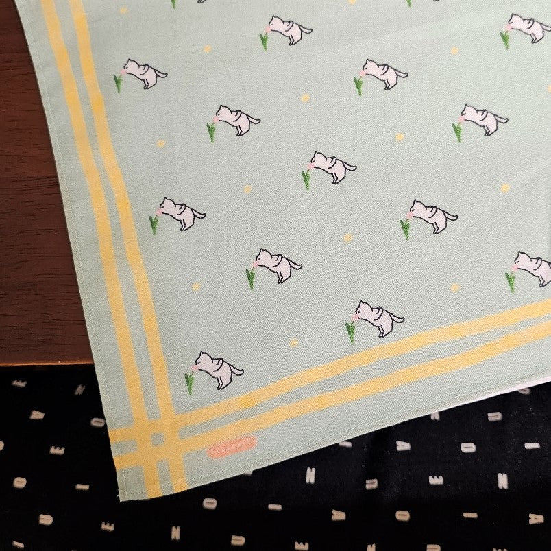 Handkerchief 3 - A cat smelling flowers