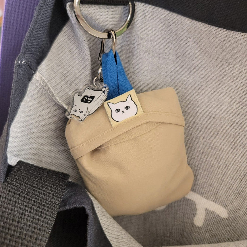 Handkerchief 3 - A cat smelling flowers