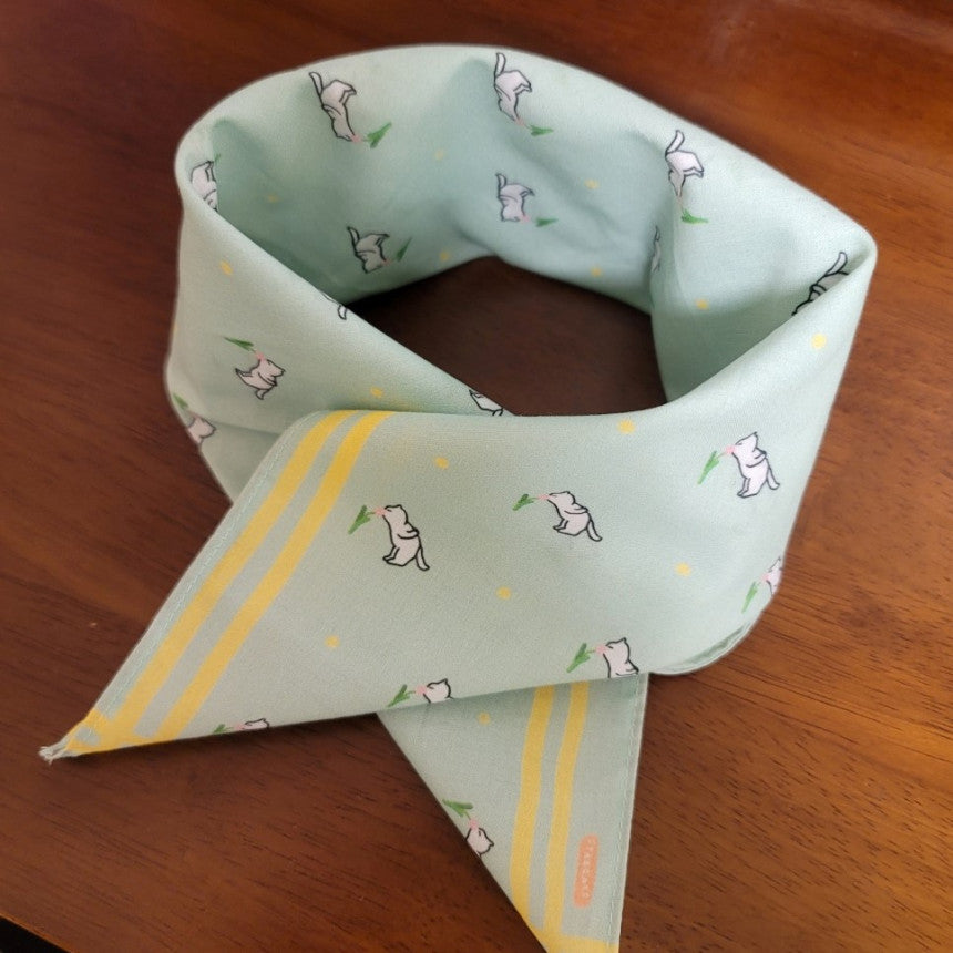 Handkerchief 3 - A cat smelling flowers