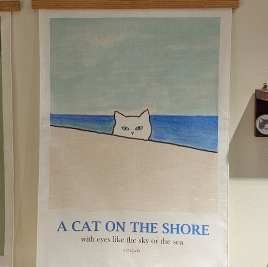 A cat on the shore, fabric poster