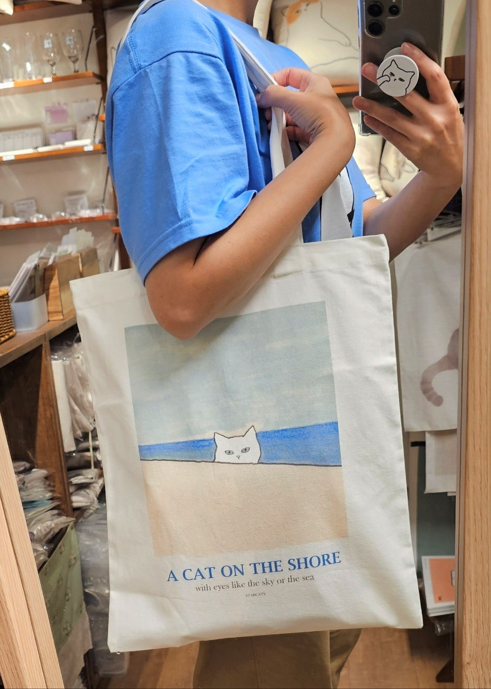 A cat on the shore, Ecobag
