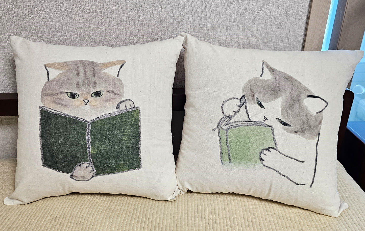 cat reading a book cushion cover