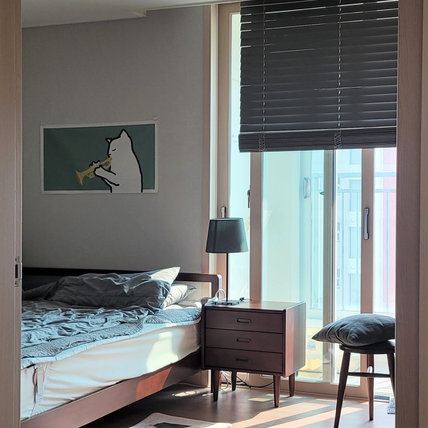 A cat playing the trumpet fabric poster
