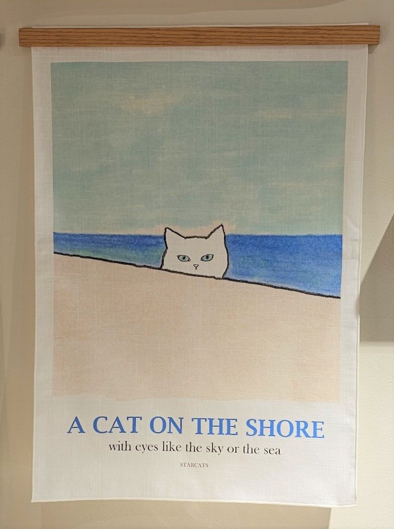 A cat on the shore, fabric poster